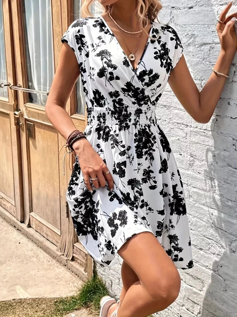 Floral Print Surplice Mini Dress - White by Trendsi from FREYA’S CLOSET