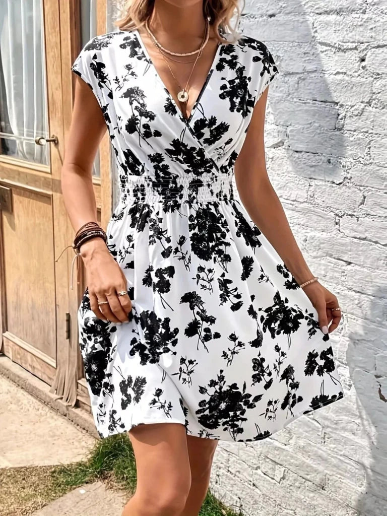 Floral Print Surplice Mini Dress - White by Trendsi from FREYA’S CLOSET