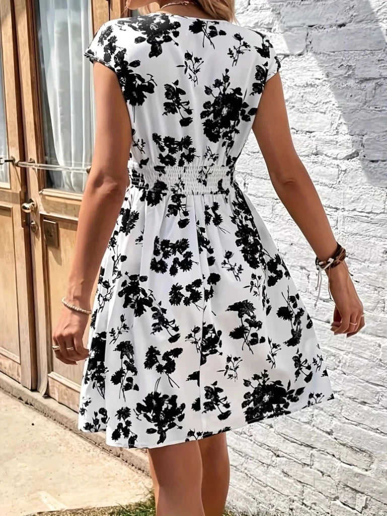 Floral Print Surplice Mini Dress - White by Trendsi from FREYA’S CLOSET
