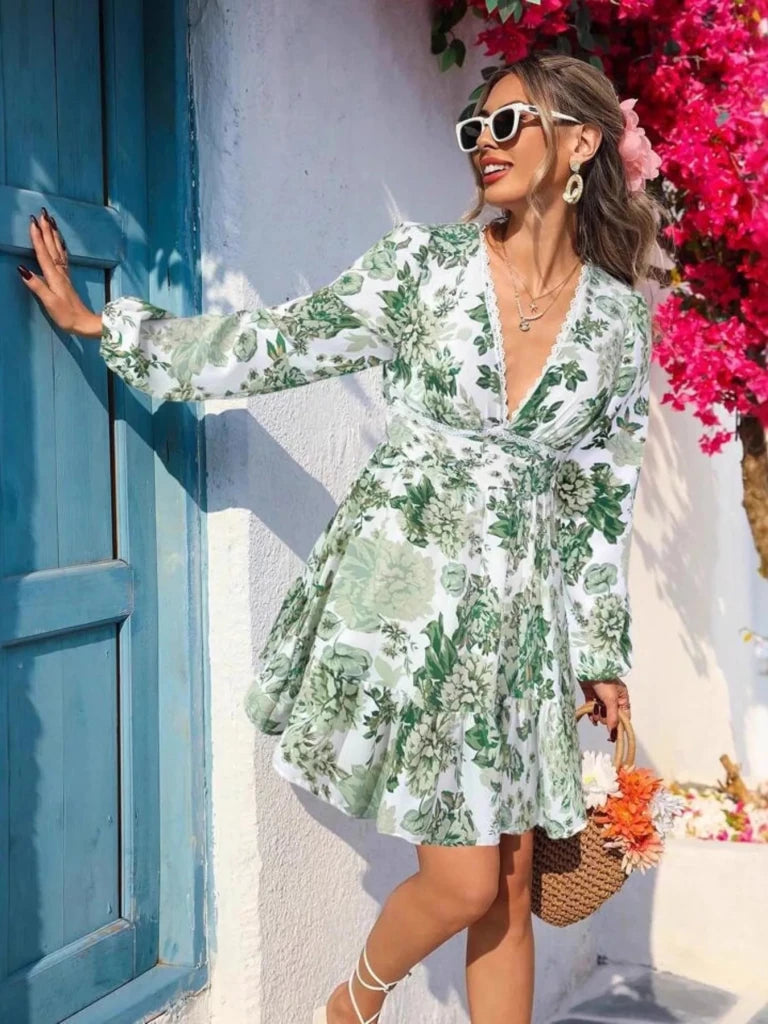 Full Size Floral Print V - Neck Long Sleeve Ruffle Hem Mini Dress Plus Size - Green by Trendsi from FREYA’S CLOSET