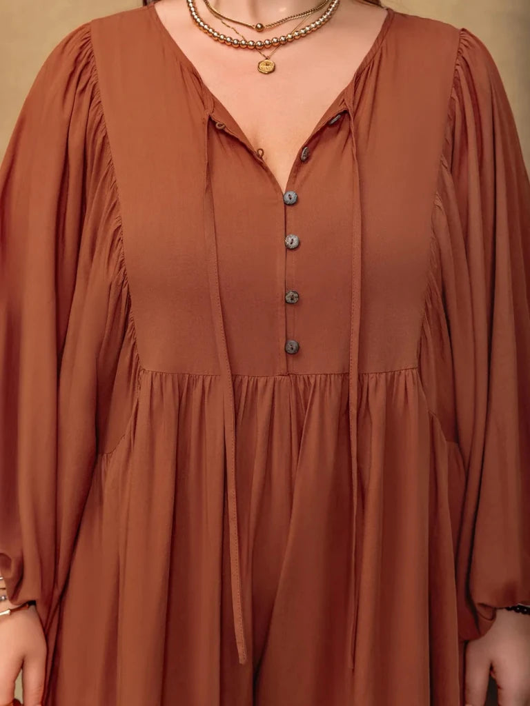 Plus Size Ruched Tie Neck Balloon Sleeve Romper - Caramel by Trendsi from FREYA’S CLOSET