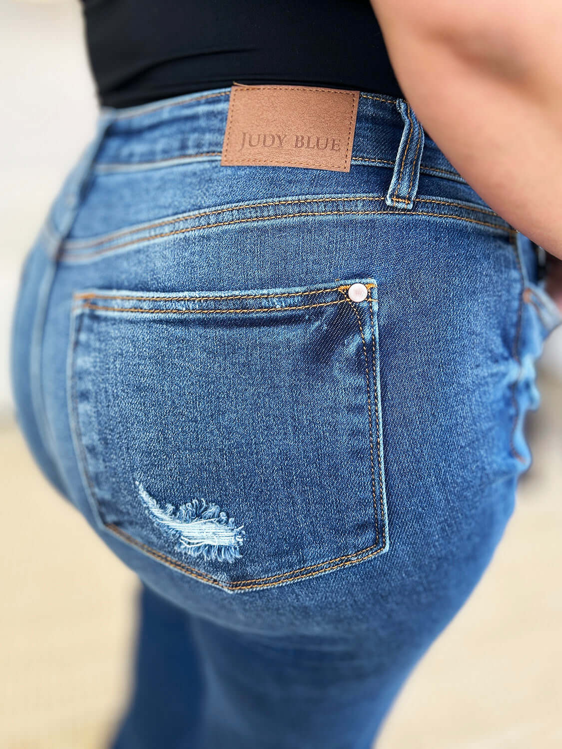 Trendsi Jeans Judy Blue Full Size Mid Rise Distressed Raw Hem Jeans Judy Blue Full Size Mid Rise Distressed Raw Hem Jeans